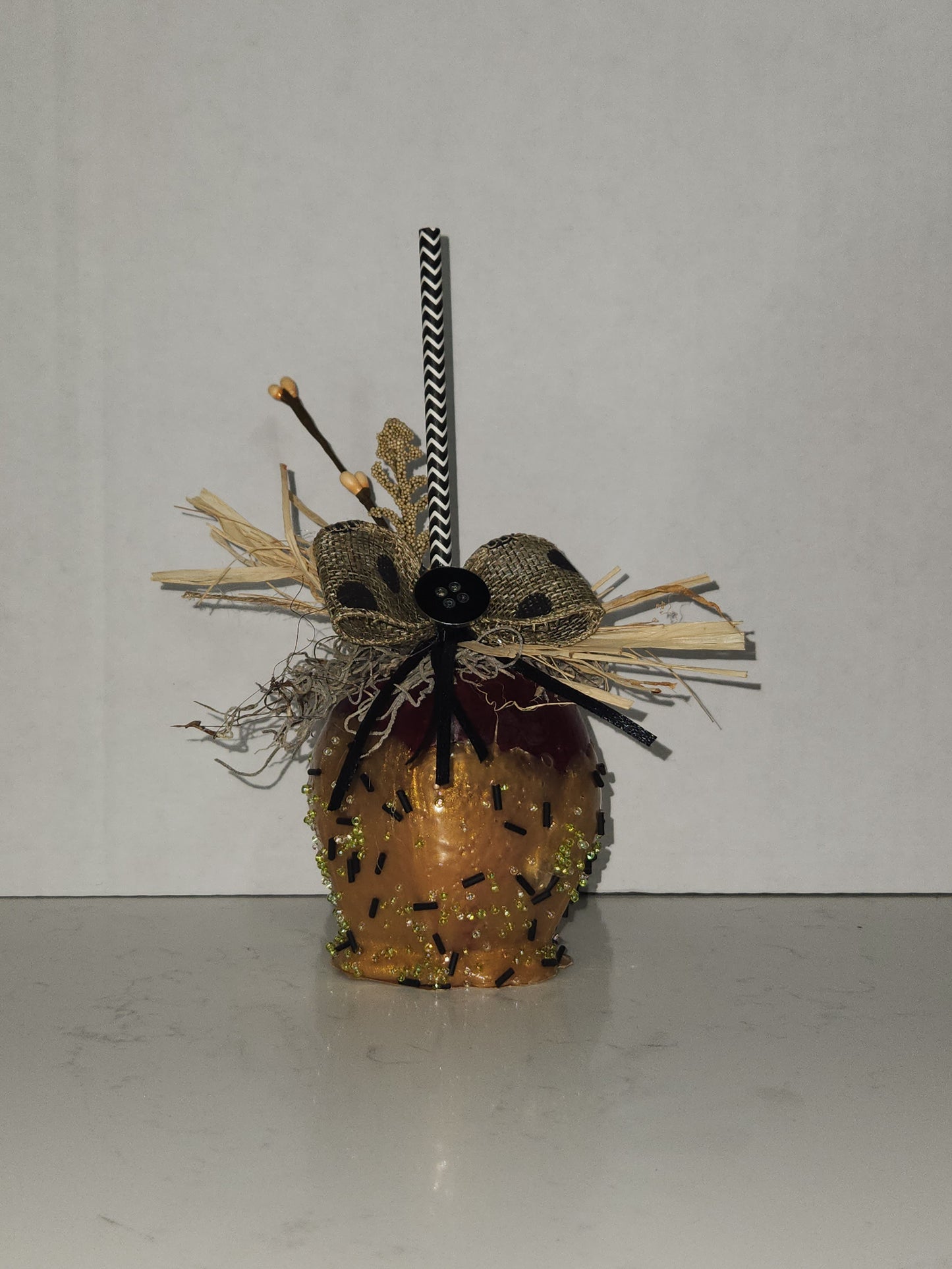faux decorative caramel apple