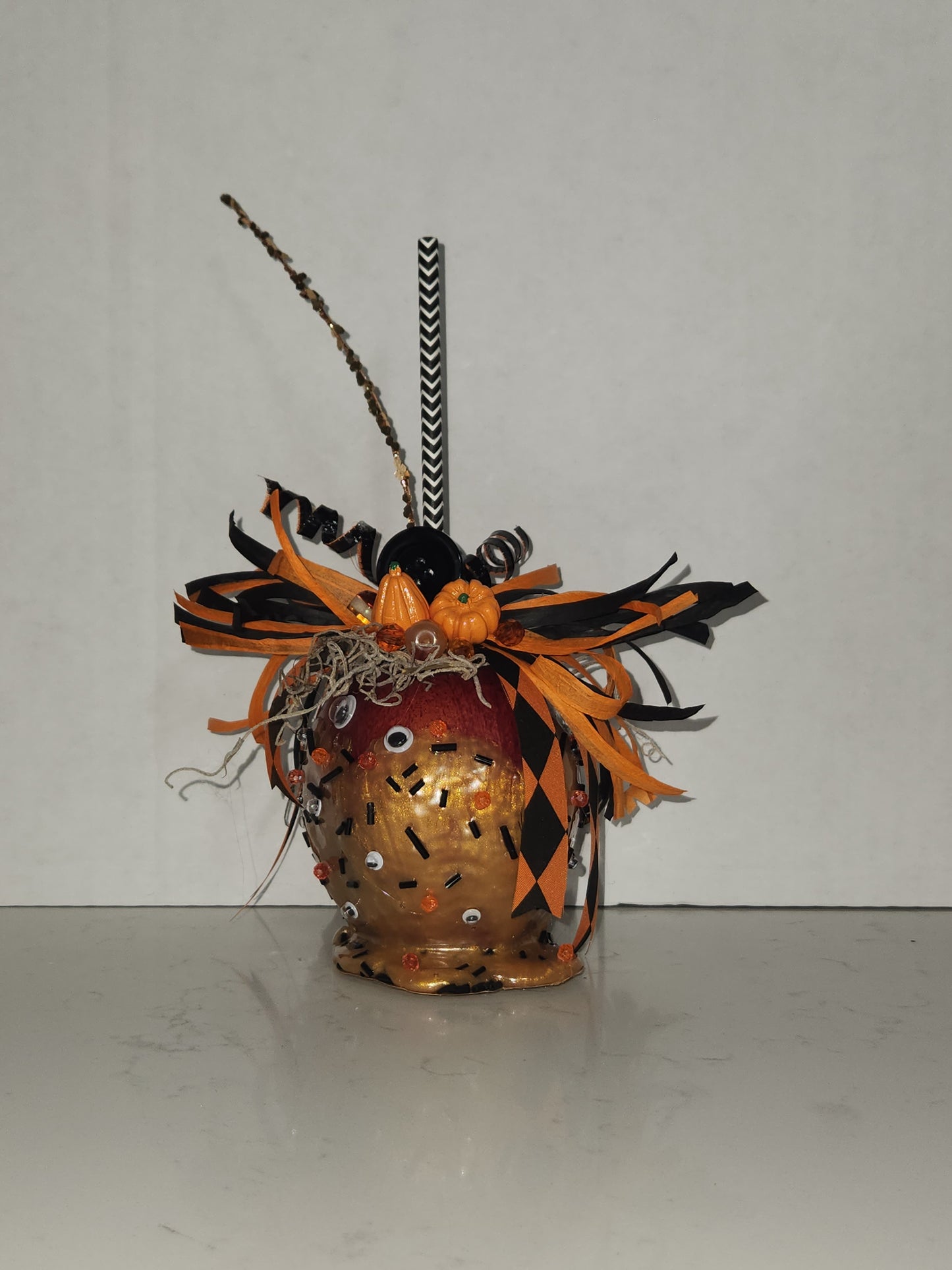 faux decorative caramel apple