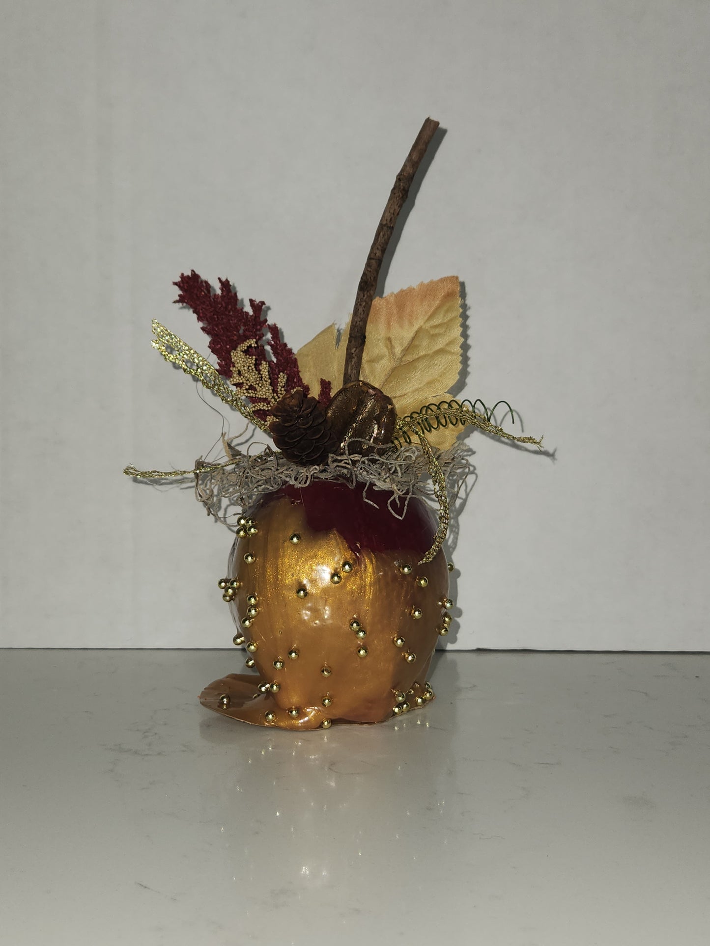 faux decorative caramel apple