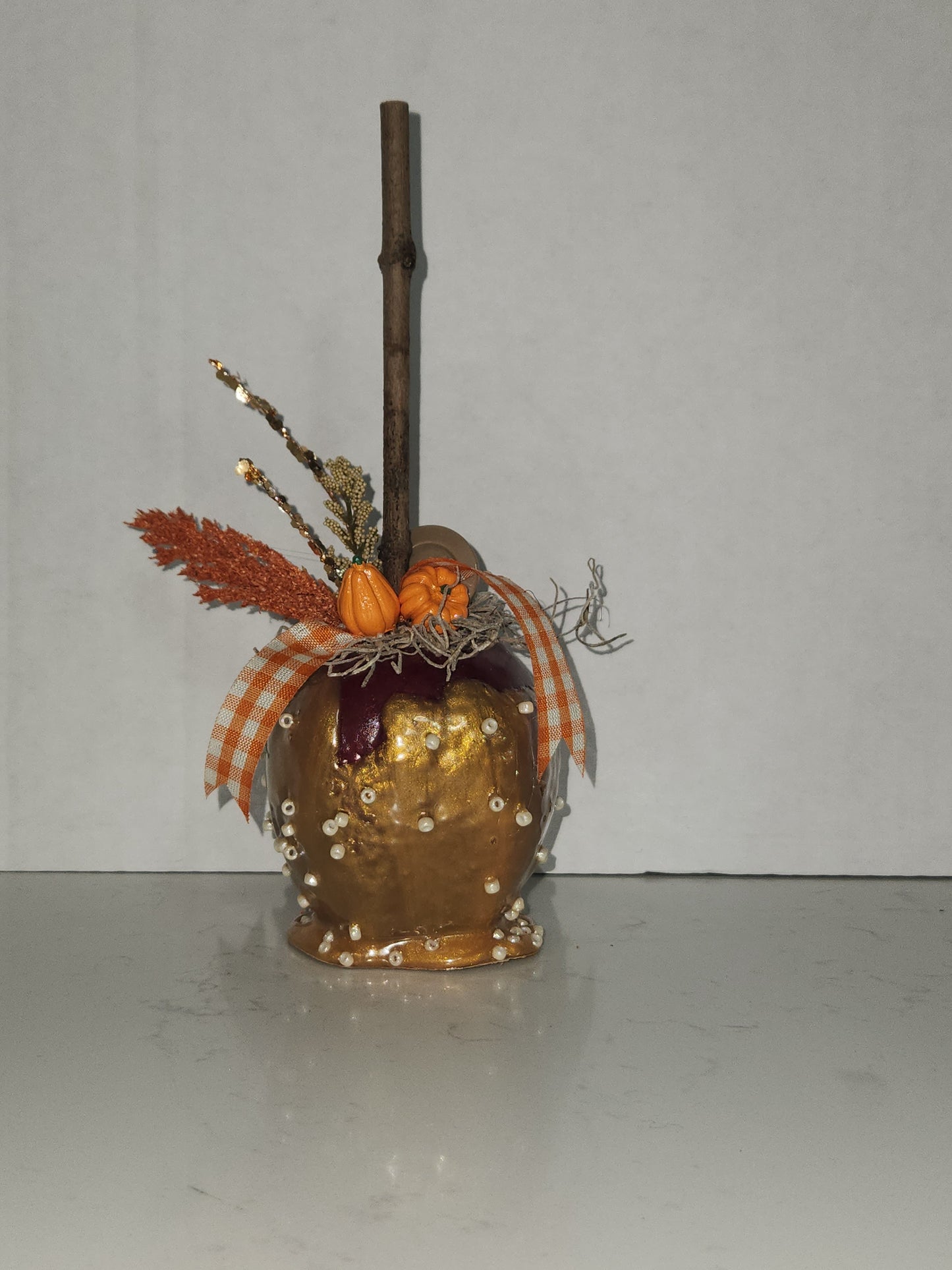 faux decorative caramel apple