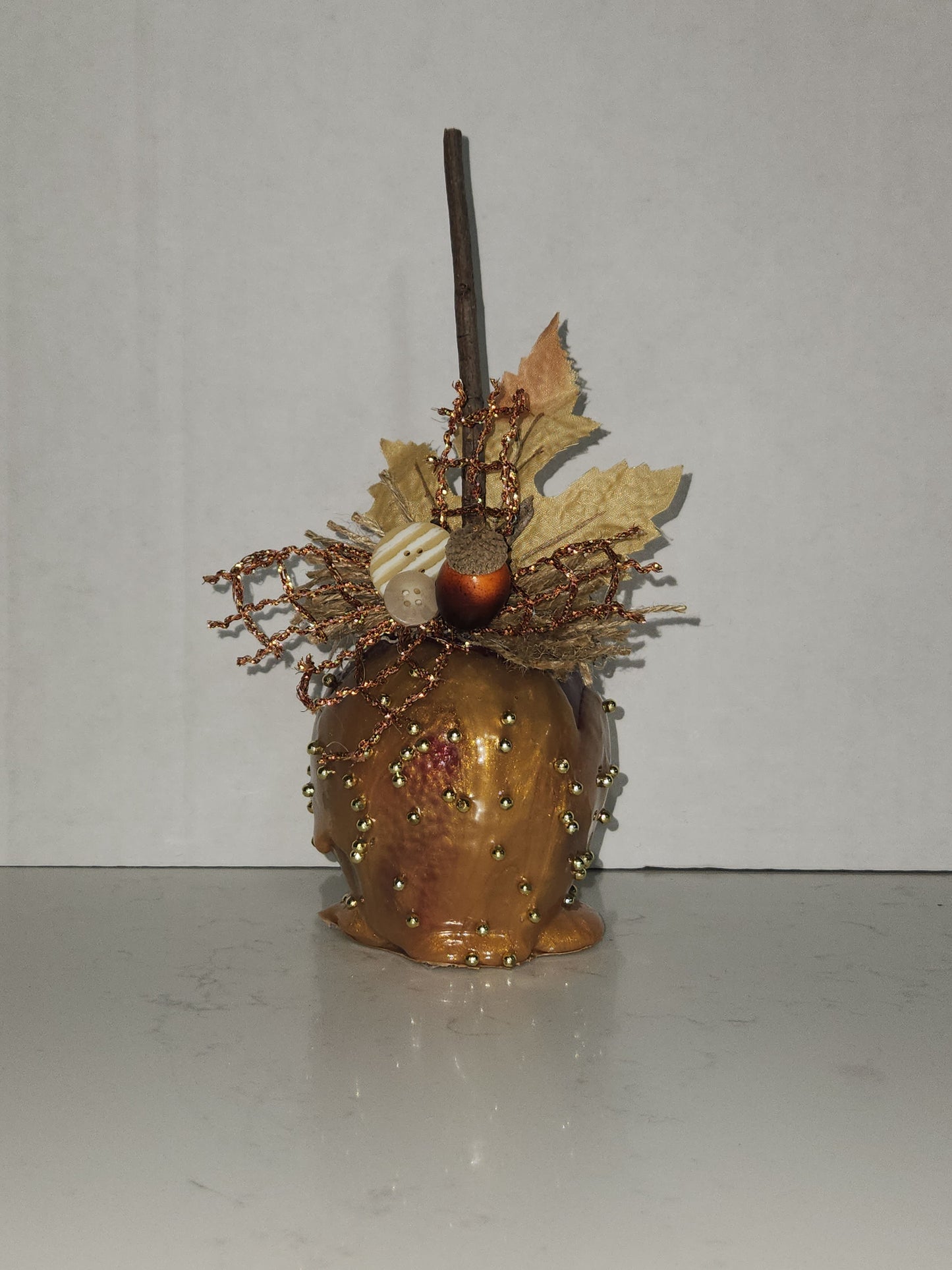 faux decorative caramel apple