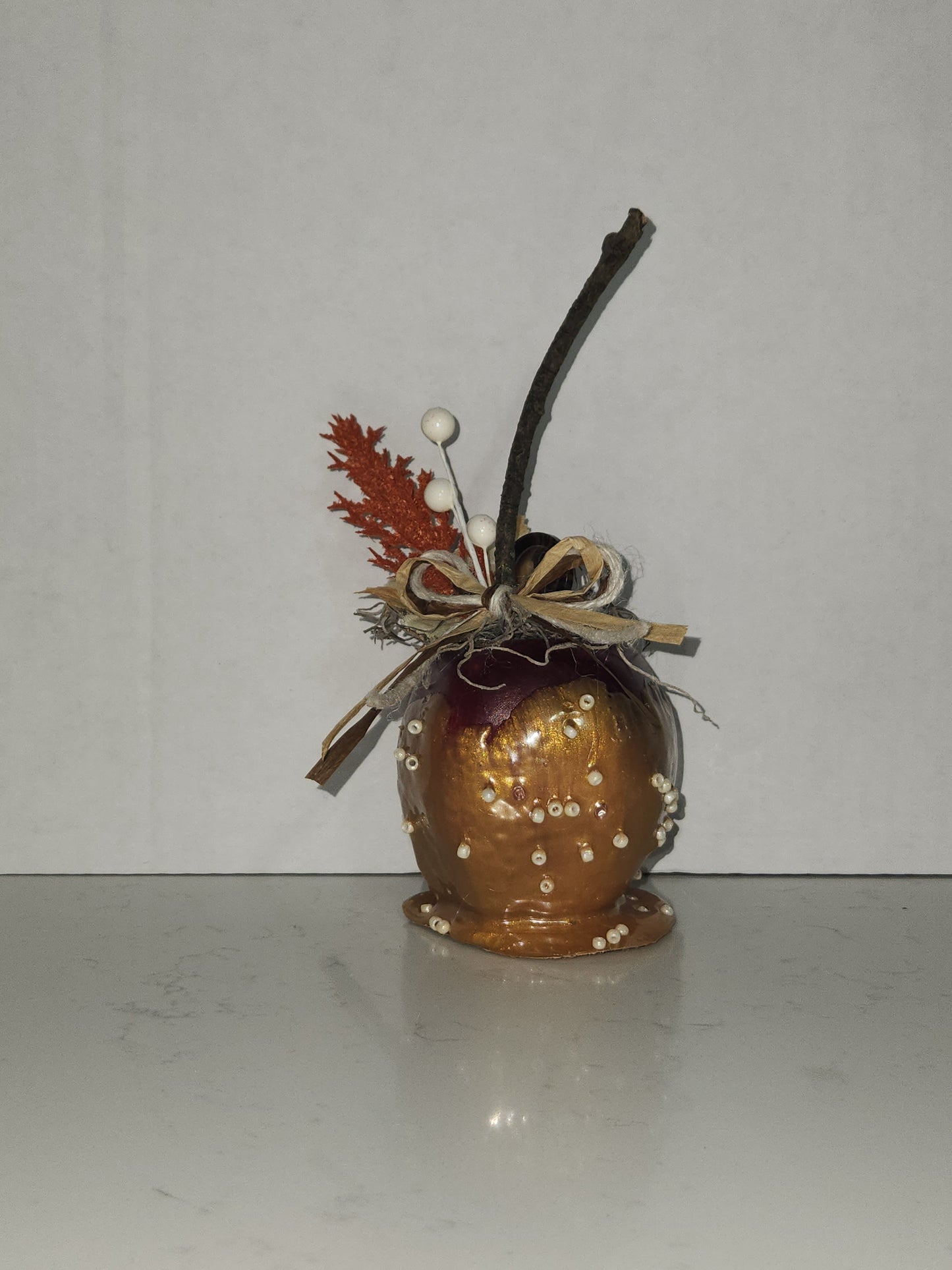 faux decorative caramel apple