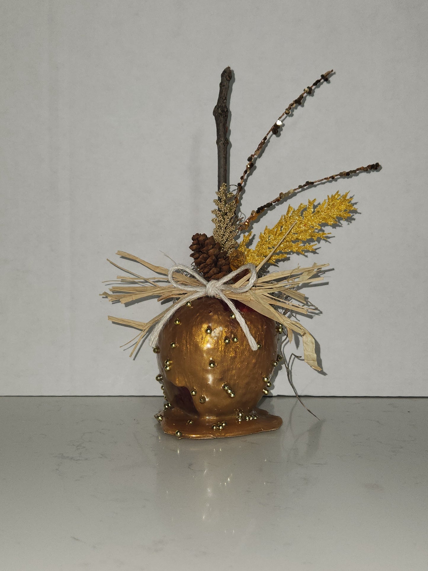 faux decorative caramel apple