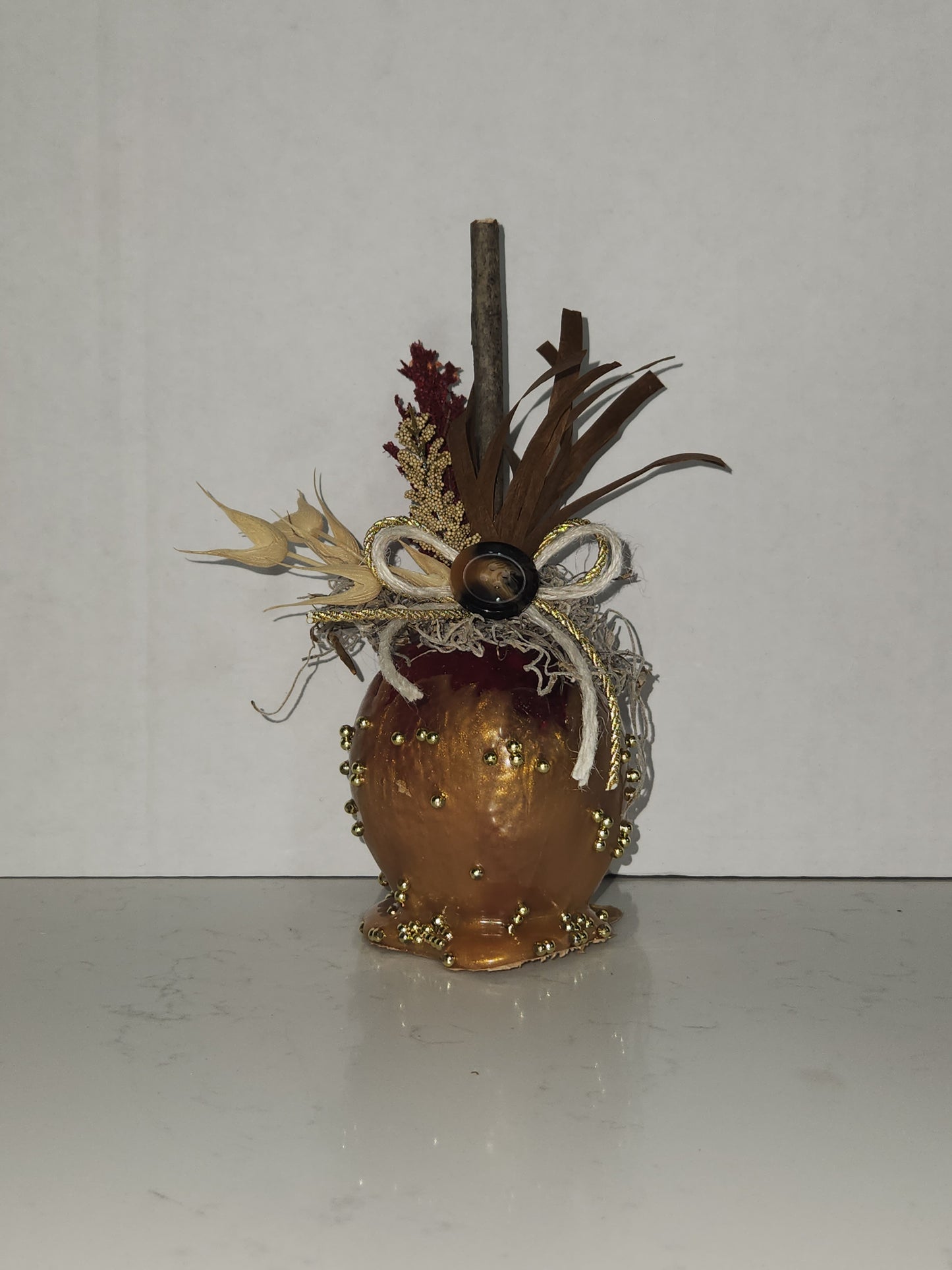 faux decorative caramel apple