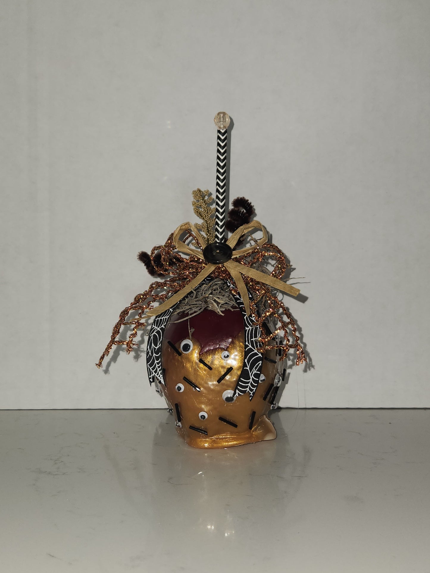 faux decorative caramel apple