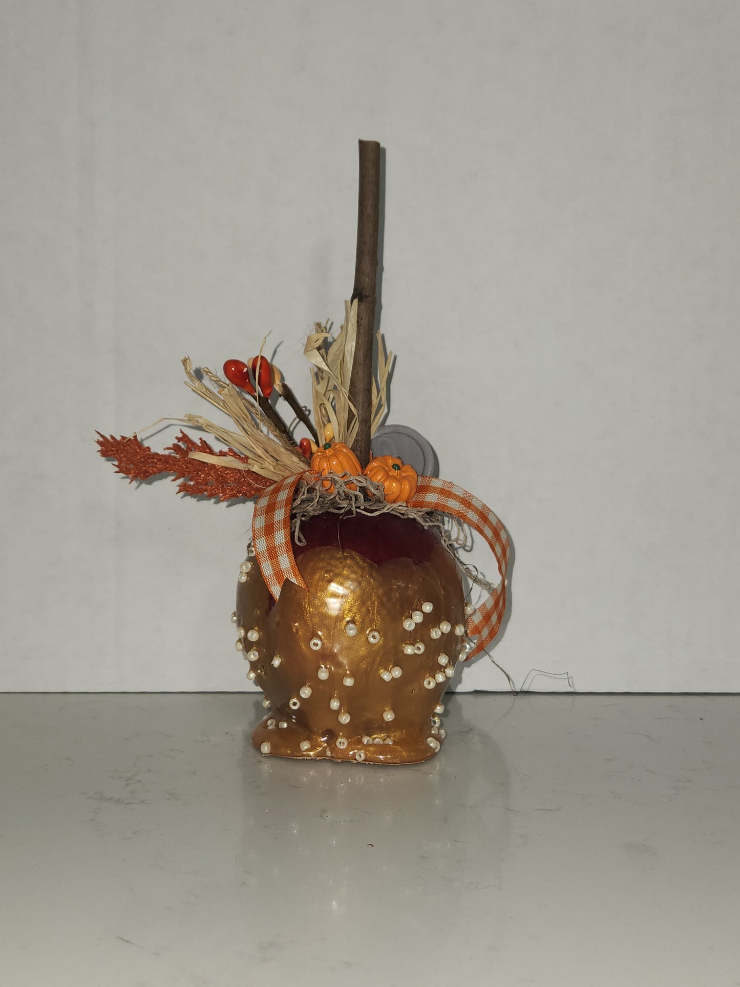 faux decorative caramel apple