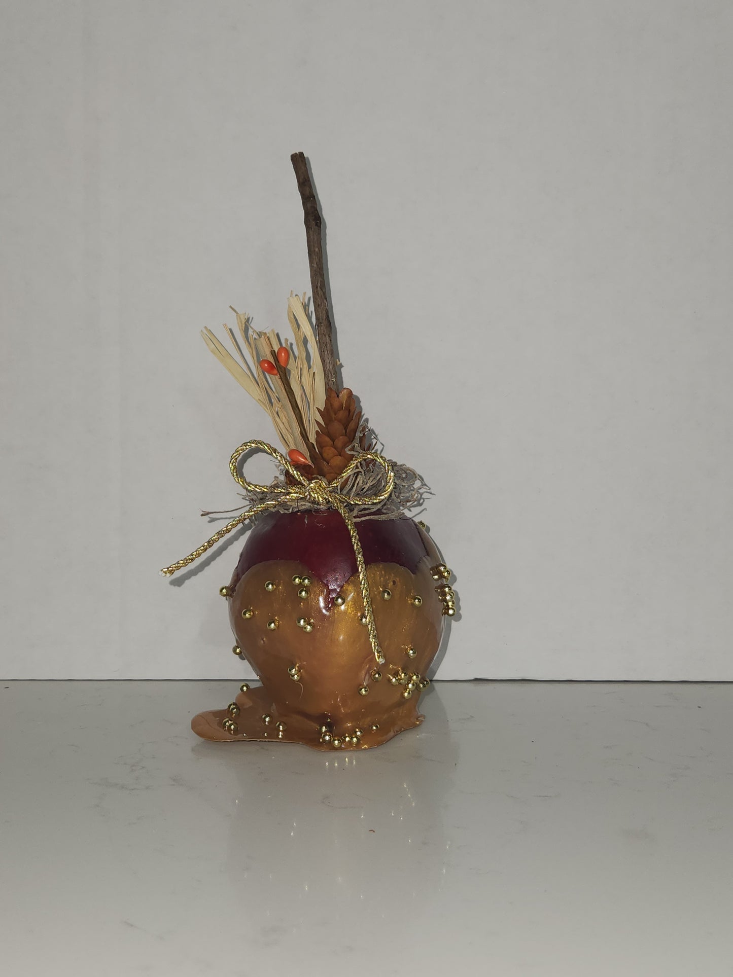 faux decorative caramel apple