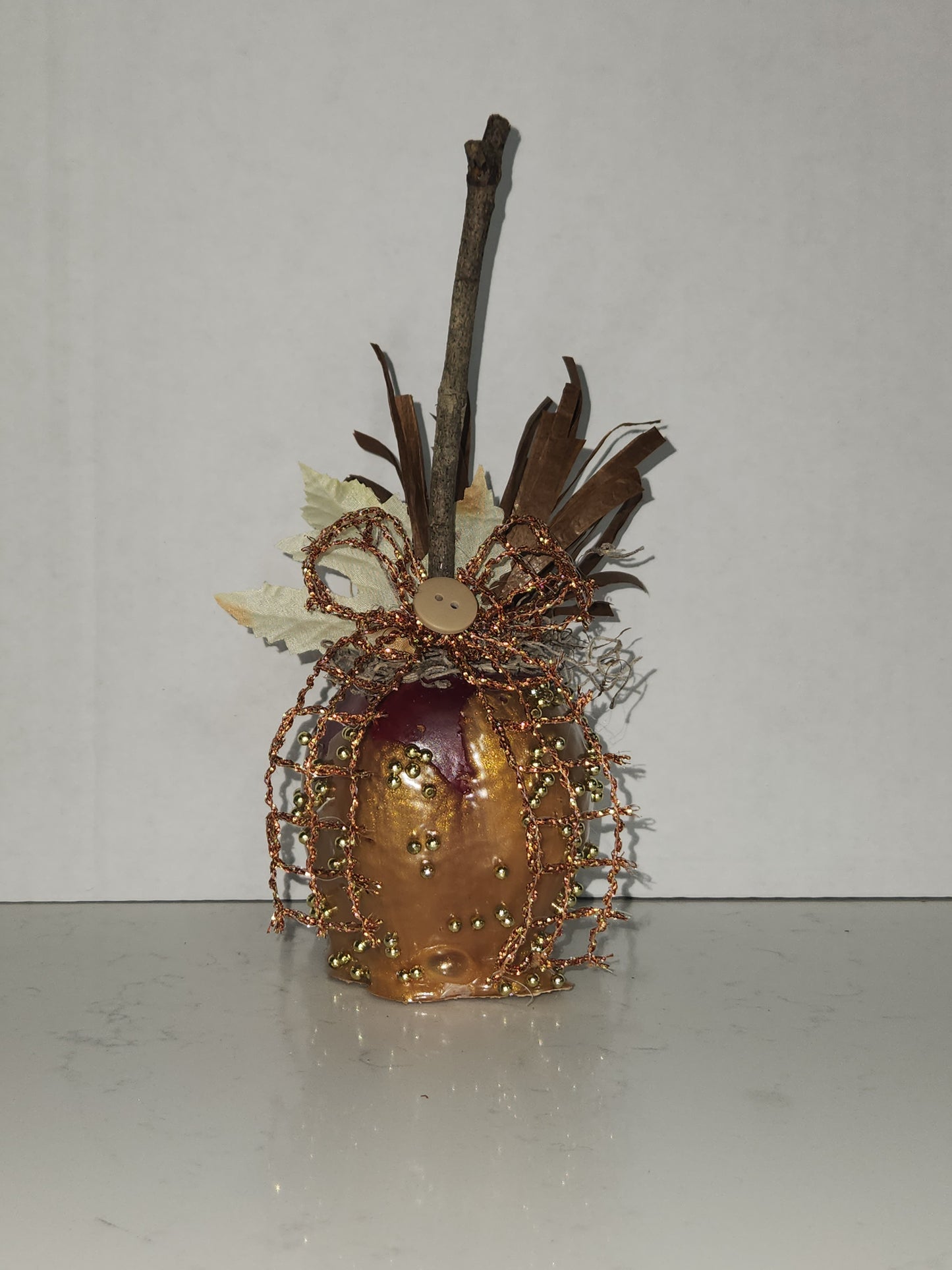 faux decorative caramel apple